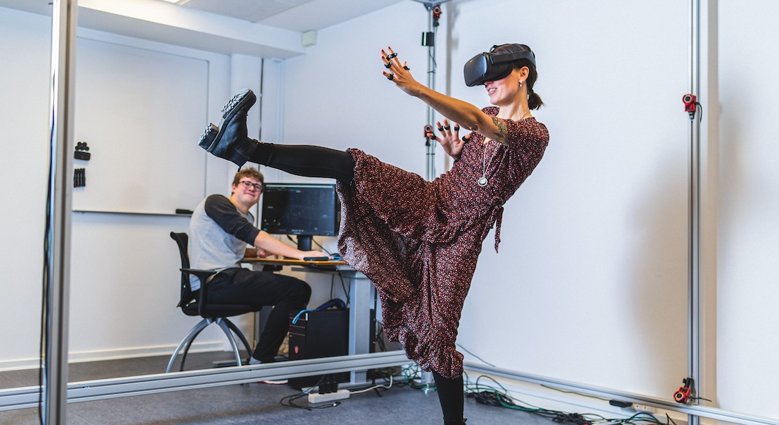 Woman in presence lab with VR glasses